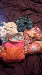 A few of our cloth diapers.  They can also be used as swim diapers or covers if we take the inserts out!