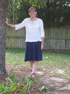 Blue skirt with white dots, white shirt